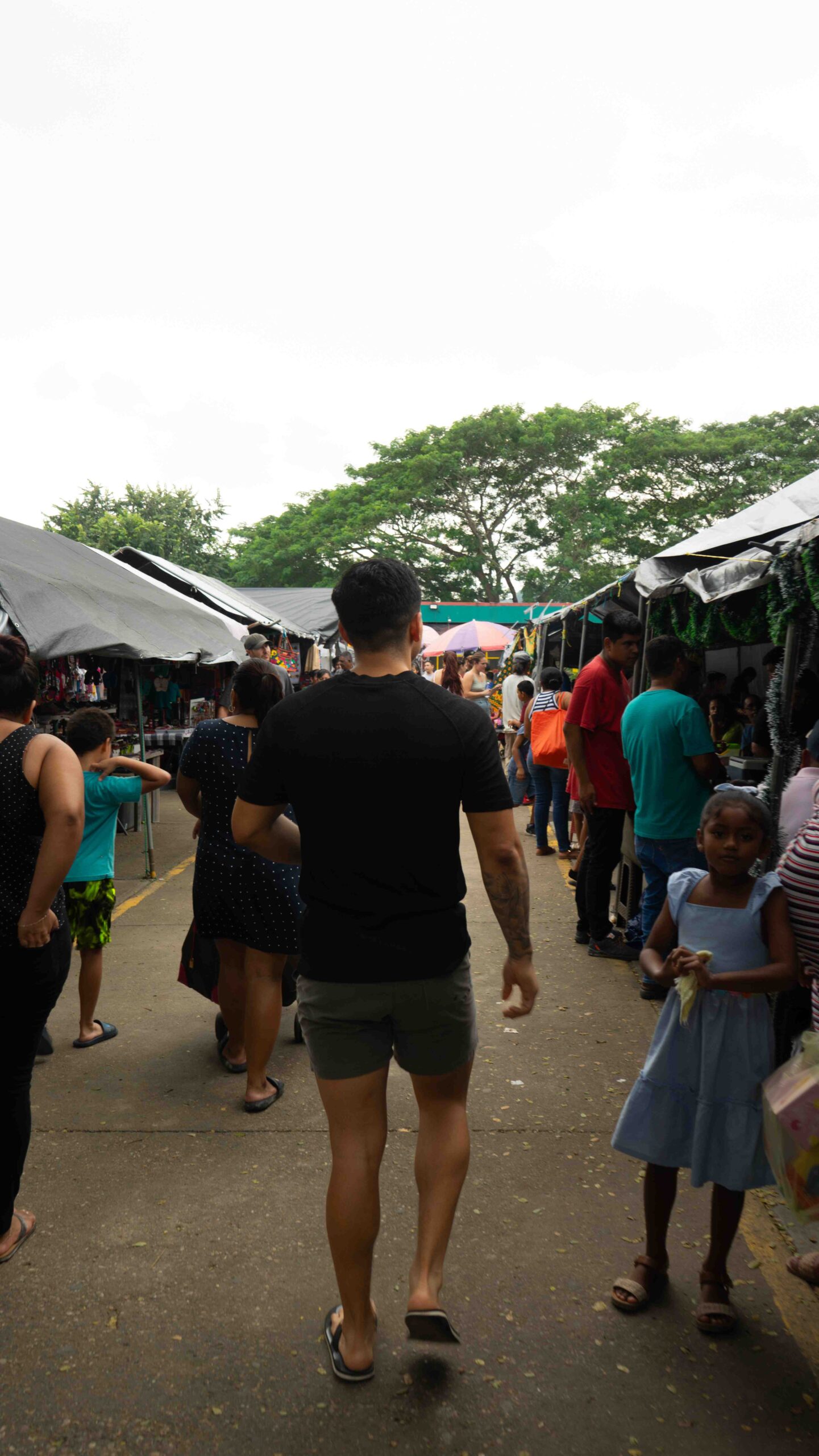 man_walking_San_Ignacio_Market, San_Ignacio_Market, Western_Belize