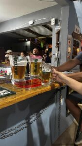 Draft beer pitchers from Ruta La Frontera, Benque